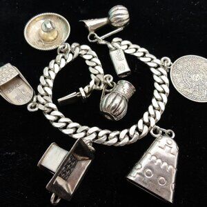 Sterling Silver Mexican Hat, Jug, Bell, Coin, Slipper Charm Bracelet